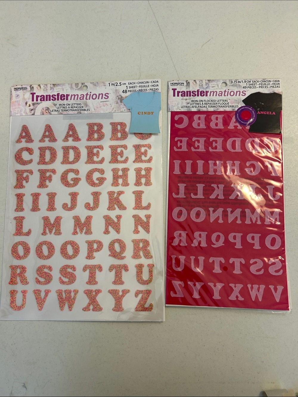 2 sets of iron on letters